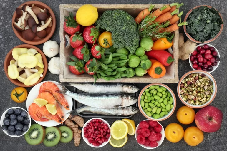 feel-good whole-food nutrition - table full of healthy food